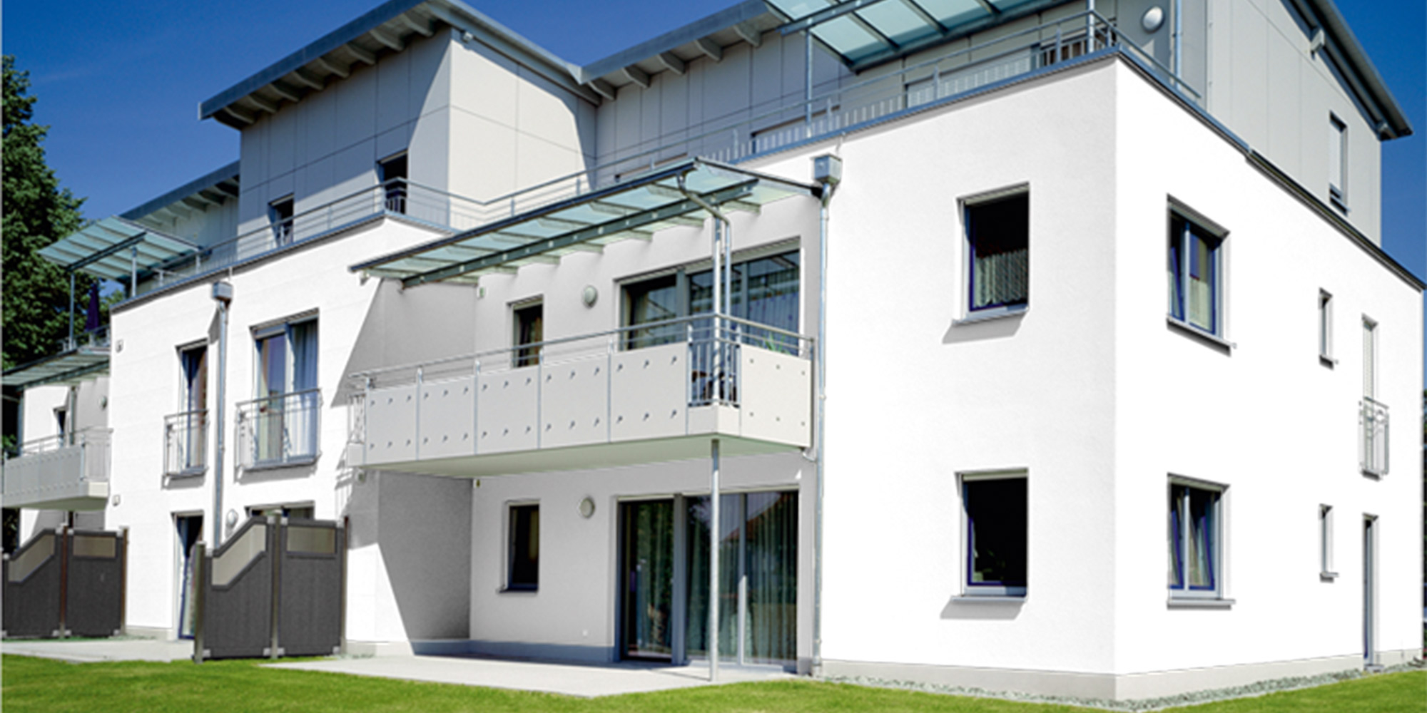 Modern residential building with light facade as an example for brushable facade filler