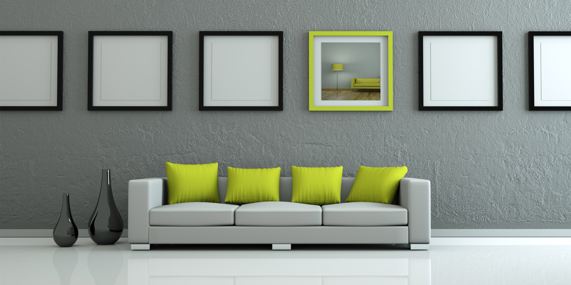 Modernes Wohnzimmer mit grauer Wand, weißem Sofa und grünen Akzenten, dekoriert mit Bildern und Vasen