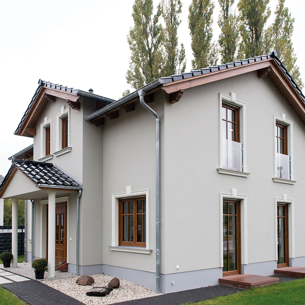 Use facade profiles for a touch of elegance Exterior mouldings around windows and doors of a house
